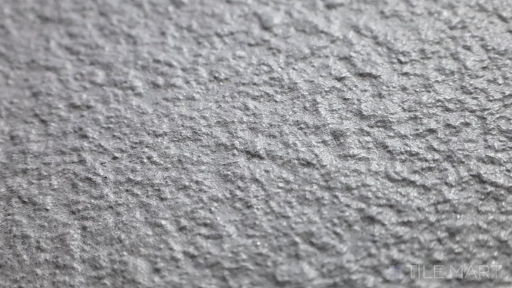 Video showcasing Urban Living Titanium 12X24 Raw Porcelain. A bold, dark grey tile with a raw surface for a rugged, modern look.