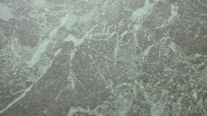 Video highlighting Tele Di Marmo Revolution Verde St Denis 24X48 Matte Porcelain. A lush green marble-effect tile with a velvety matte texture, evoking timeless luxury.