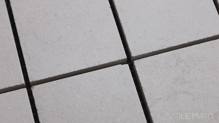 Video featuring Urban Living Tan 2" Square Matte Porcelain Mosaic. A warm, neutral-toned mosaic tile with a matte surface, ideal for bathrooms and backsplashes.