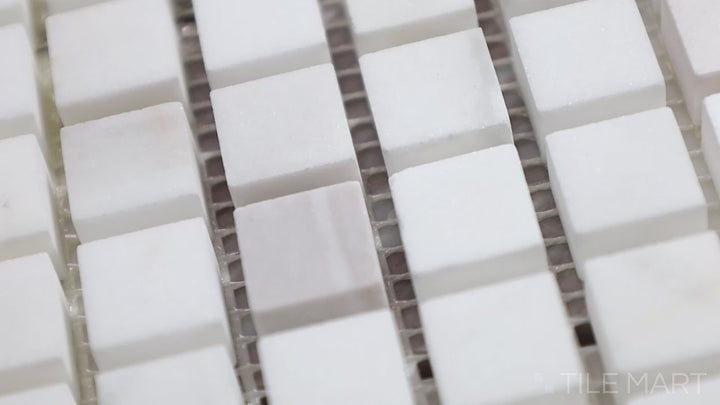 Video of Sto-Re Volakas 5/8" Mini Square Polished Marble Mosaic. A refined Volakas marble mosaic with polished mini squares, enhancing depth and texture.