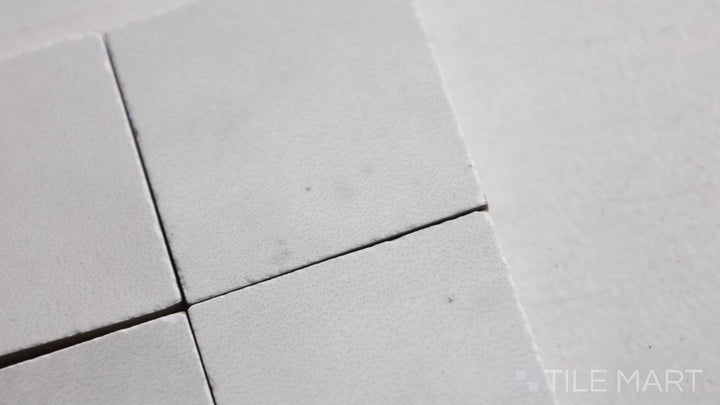 Video of Kasbah Taco White 1X1 Matte Porcelain Tile. A bright white mini tile that enhances light reflection while adding subtle texture.
