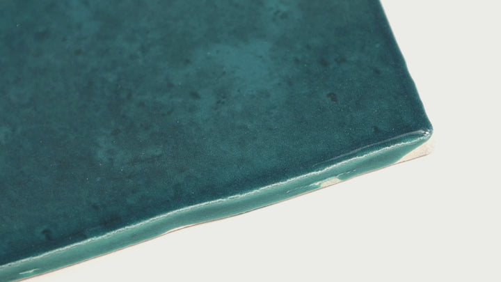 Video highlighting Mesmerist Mystique 3X6 Glossy Glazed Ceramic. A deep glossy tile with a smooth surface, perfect for creating a polished and luxurious aesthetic.