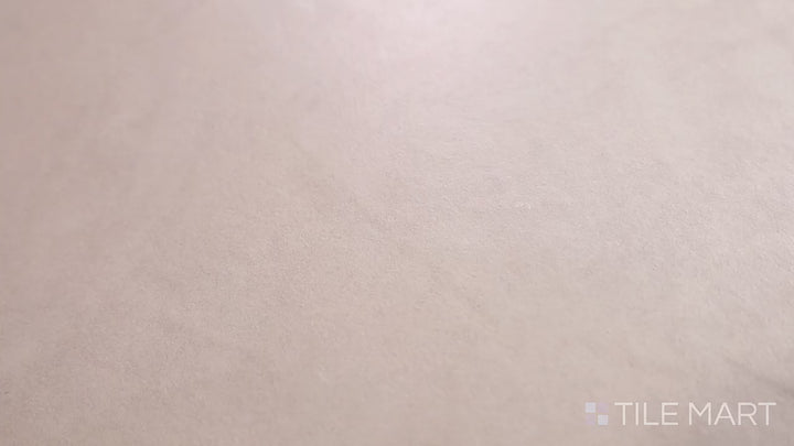 Video featuring Creos Cookie 48x48 Matte Porcelain. A warm beige porcelain tile with a smooth matte surface, delivering a modern and inviting aesthetic.