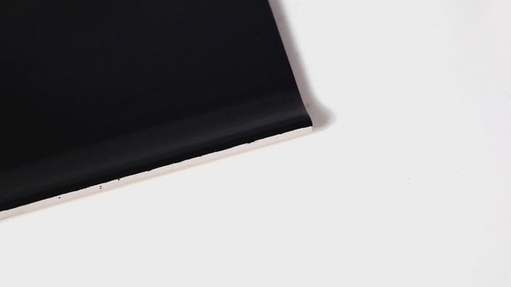 Video of Sanitary Cove Base Black 6x6 Glossy Ceramic. A deep black glossy ceramic cove base tile, adding contrast and a sleek finishing detail.