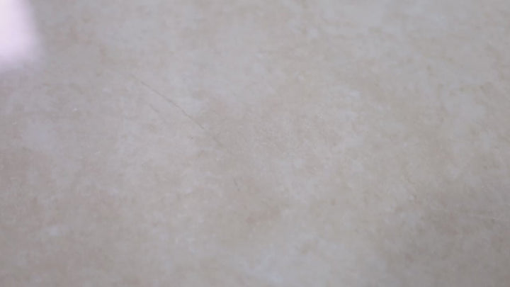 Video showcasing Lugano Marfil 24x24 Polished Porcelain. A warm beige polished porcelain tile with subtle veining, offering a refined and elegant marble-inspired look.