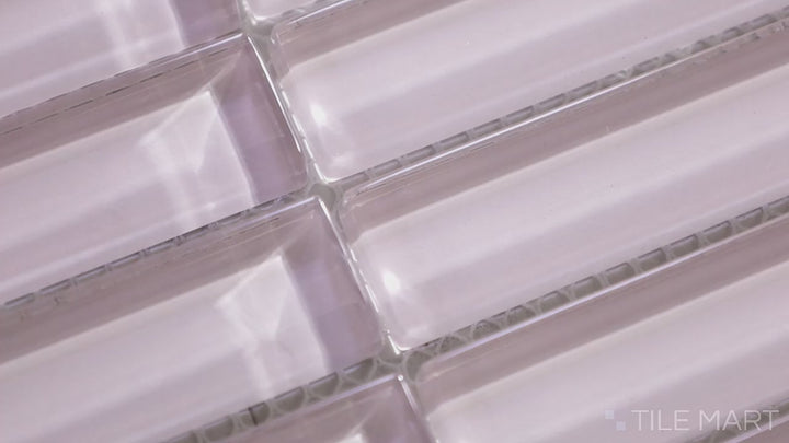 Video featuring Glass Pastel Pink Grid Glossy Mosaic. A charming pastel pink glass mosaic with a polished glossy finish, designed in a grid pattern for a refined and delicate aesthetic.