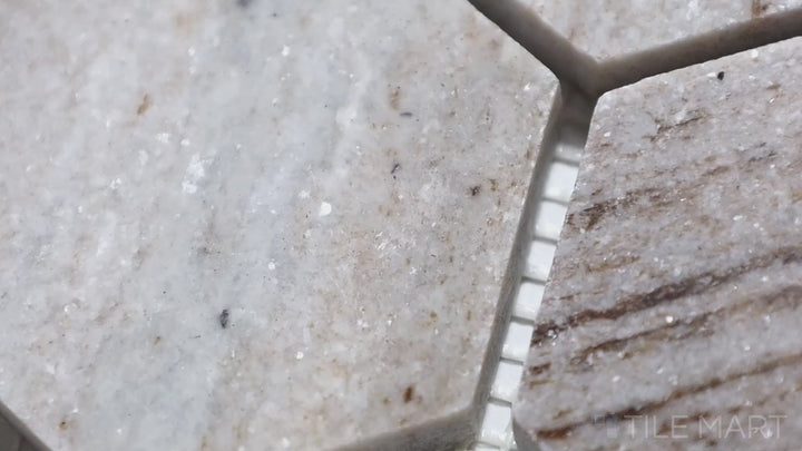 Video of Sto-Re Ocean White 4" Hexagon Polished Marble Mosaic. A sleek Ocean White marble mosaic with a polished surface, cut in a modern hexagonal shape to enhance any space.