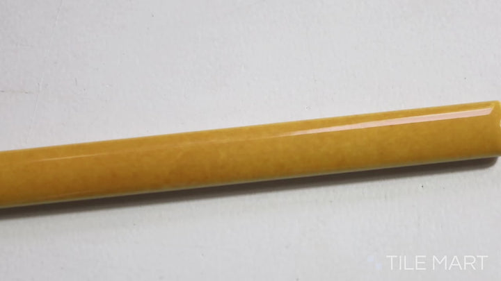 Video showcasing Village Tuscany Gold 0.5X8 Glossy Ceramic Jolly Trim. A warm golden trim tile with a glossy surface, inspired by Tuscan interiors.