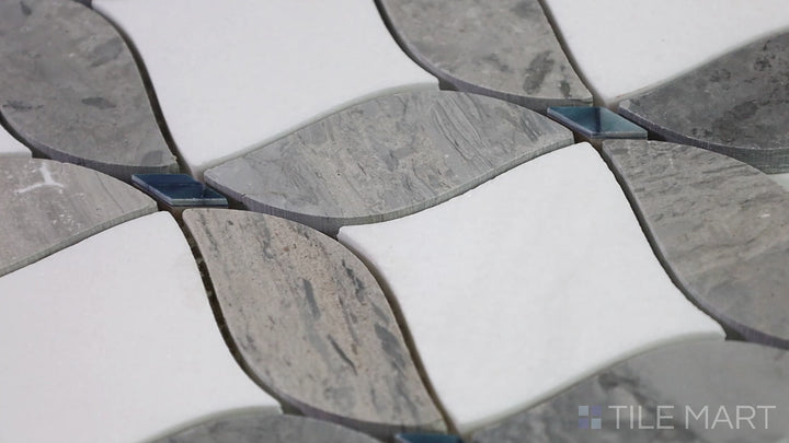 Video showcasing D-Lux Pearl Grey Adley Polished Shell Marble Mosaic. A luxurious mosaic tile featuring polished shell and grey marble accents, perfect for elevating interior designs.