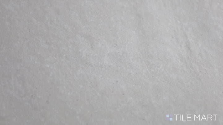 Video showcasing Allora White 8.5X10 Matte Glazed Porcelain. A crisp white matte porcelain tile with a subtle geometric shape, enhancing bright, clean interiors.