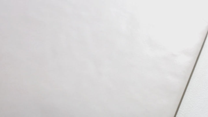 Video of Kite White 4x12 Matte Porcelain. A crisp white matte porcelain tile with a smooth surface, creating a fresh and minimalist aesthetic.