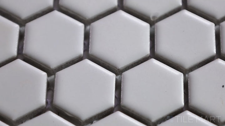 Video highlighting Porcelain Glazed Mosaics White 1-inch Hexagon Matte. A crisp white matte porcelain hexagonal mosaic, bringing a clean and minimalist aesthetic.