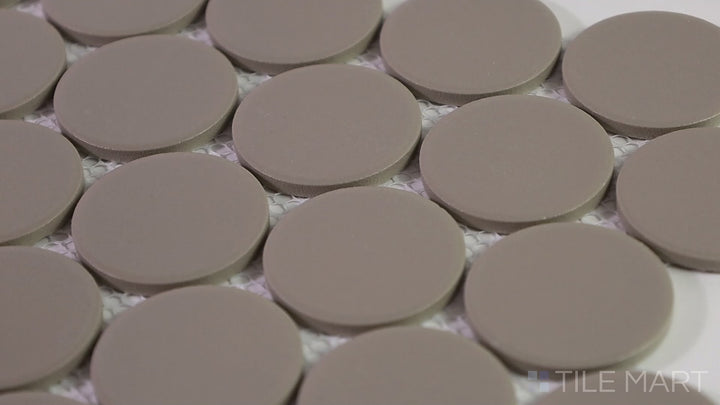 Video showcasing Marin Coastal Cliff 2" Penny Round Matte Glazed Porcelain Mosaic. A soft, natural-toned mosaic with a smooth matte finish, ideal for coastal-inspired interiors.