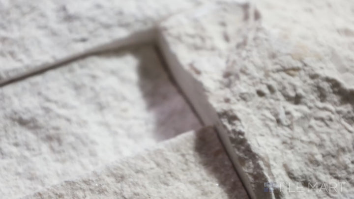 Video highlighting Rockmount White 6X24 Stacked Stone Panel Splitface Limestone. A bright white limestone stacked stone panel, perfect for coastal and modern aesthetics.