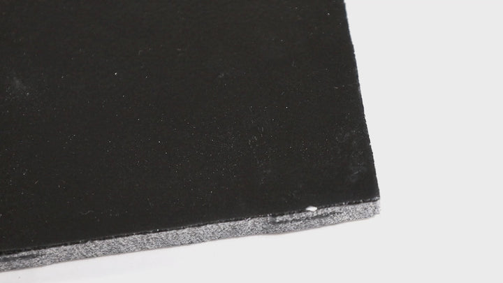 Video of Zellige Neo Carbone 4x4 glossy glazed ceramic tile capturing reflective depth and handmade surface movement.