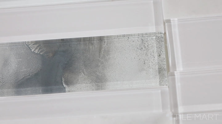 Video highlighting Simplystick Mosaix Stormy Mist And Glass Blend Polished Marble, Limestone Mosaic. A modern mosaic featuring polished marble and glass in soft grey tones.