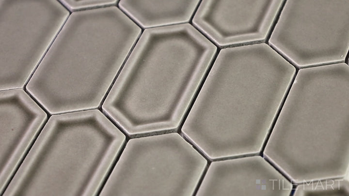 Video featuring Foundations Plains Framework Inverted Bevel Glossy Ceramic Mosaic. A contemporary ceramic mosaic with a high-gloss finish, perfect for modern interiors and accent walls.