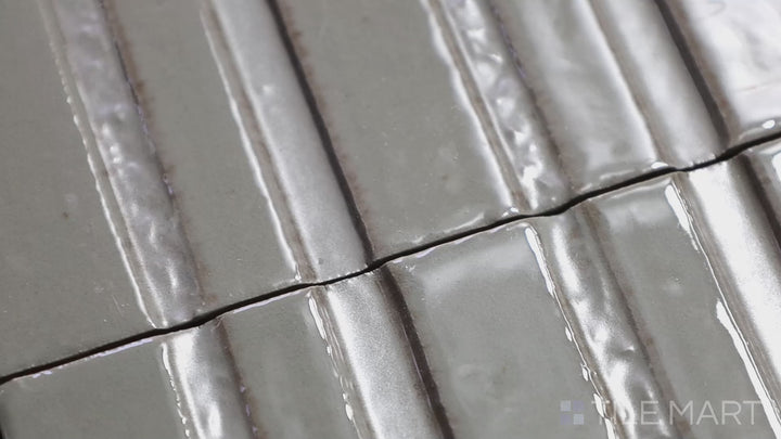 Video showcasing Glace Muschio 3X8 Glossy Porcelain. A sophisticated forest green glossy tile, ideal for accent walls and feature designs.