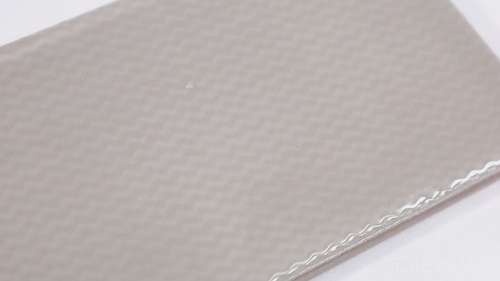 Video featuring Zen Morning Deco 3X12 Glossy Ceramic. A tranquil off-white ceramic tile with a decorative glossy finish, enhancing interiors with its minimalist charm.