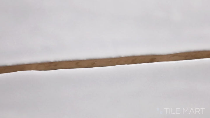 Video highlighting Marin Pebble Gray 2.5X10 Gloss Glazed Ceramic. A versatile gray glossy tile in a modern elongated size, ideal for sleek contemporary designs.