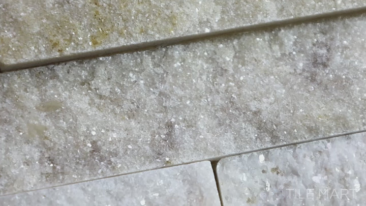 Video showcasing Rockmount Honey 6X24 Stacked Stone Panel Splitface Quartzite. A warm quartzite stacked stone panel with golden hues, adding natural texture to walls.