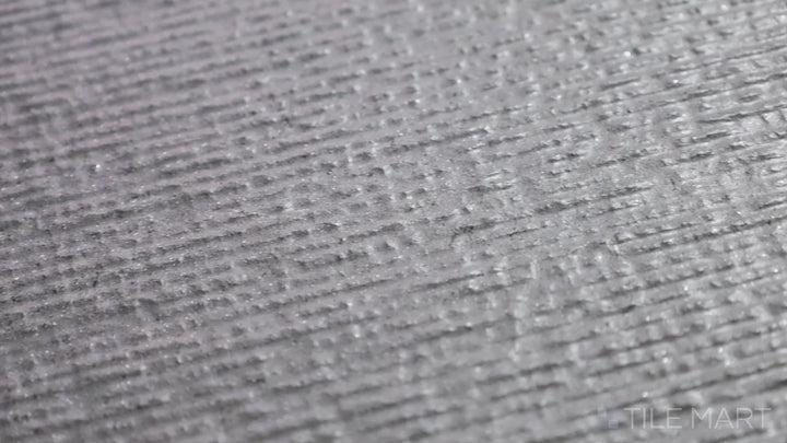 Video showcasing Urban Living Metropolis 12X24 Chiseled Porcelain. A textured, industrial-style tile with deep grey hues and a chiseled surface for added character.