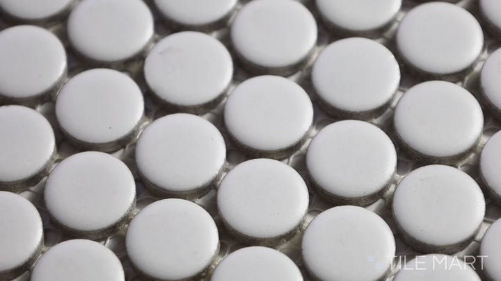Video featuring Pure White Penny Round Matte Porcelain Mosaic. A crisp white matte porcelain penny round mosaic, offering a fresh and minimalist design.