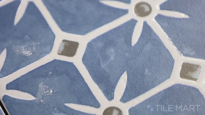 Video featuring Caliope Marine 6X6 Matte Porcelain Tile. A deep marine blue tile with a smooth matte finish, evoking a coastal aesthetic.