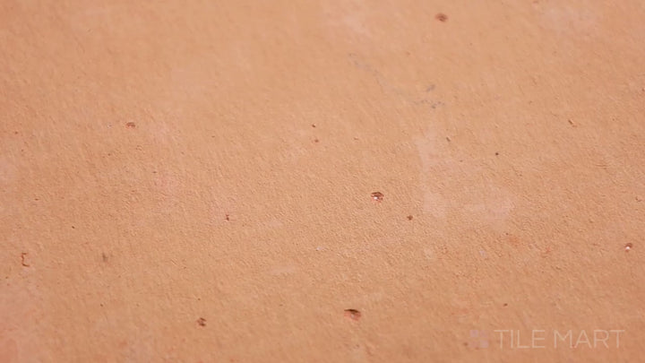 Video highlighting Saltillo Salmon 9x11 San Felipe Natural Terracotta. A uniquely shaped terracotta tile in a warm salmon hue, combining tradition with artisanal craftsmanship.