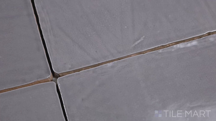 Video highlighting Vintage Grey 5X5 Glossy Ceramic Tile. A soft, neutral grey tile with a glossy ceramic finish, ideal for modern and industrial spaces.
