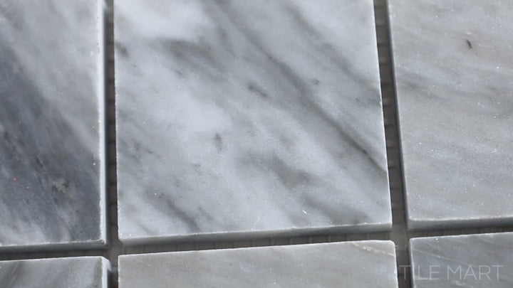 Video highlighting Sto-Re Bardiglio 2.25" Square Polished Marble Mosaic. A bold Bardiglio marble mosaic with a polished finish, featuring large square tiles for a grand statement.