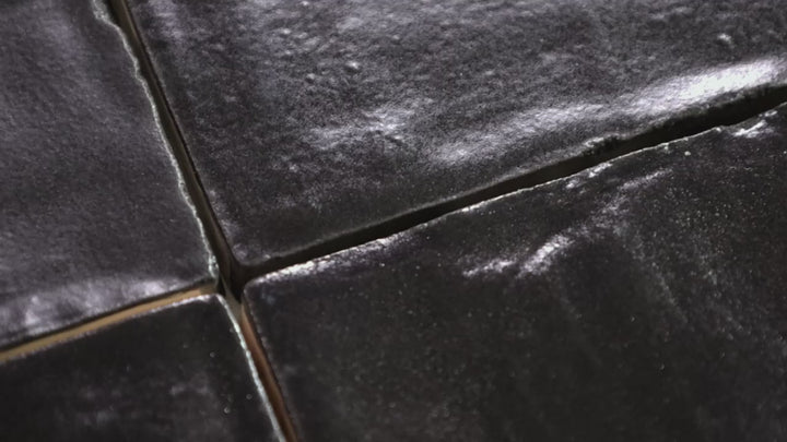 Video highlighting Mallorca Black 4x4 Matte Ceramic. A bold black ceramic tile with a matte finish, creating a sleek and dramatic look.
