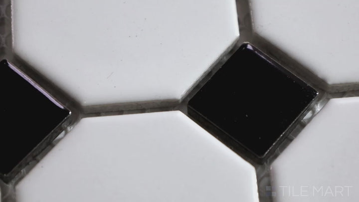 Video showcasing Porcelain Glazed Mosaics White with Black Dot 2-inch Octagon Matte. A classic white octagonal matte porcelain mosaic with bold black dots, offering a vintage-inspired pattern.