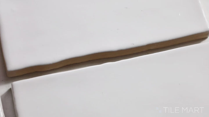 Video highlighting Marin Pearl White 2.5X5 Gloss Glazed Ceramic. A bright white glossy tile that enhances light reflection and creates an airy ambiance.