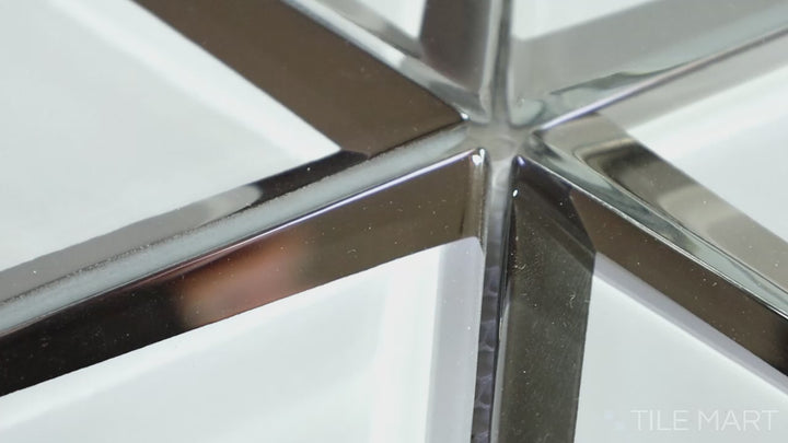 Video featuring Modern Glass White 6-inch Triangle Glossy Mosaic. A crisp white glass tile with a polished glossy surface, arranged in an elegant triangular design for a bright and contemporary aesthetic.