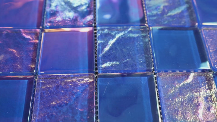 Video highlighting Vidrofina Cobalt Blue 2" Square Glossy Glass Mosaic. A deep cobalt glass tile with a luminous sheen, enhancing the sophistication of modern spaces.