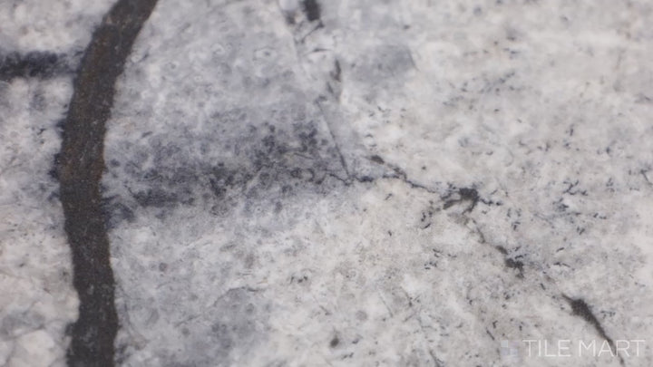 Video highlighting Exotic Stone Cosmopolitan Mystic Grey 24x48 Polished Porcelain. A sleek grey porcelain tile with a polished surface, blending modern sophistication with natural stone patterns.