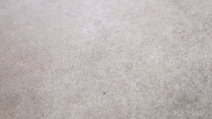 Video featuring Concrete Beige 12x24 Matte Porcelain. A neutral beige porcelain tile with a soft matte finish, offering warmth and elegance.
