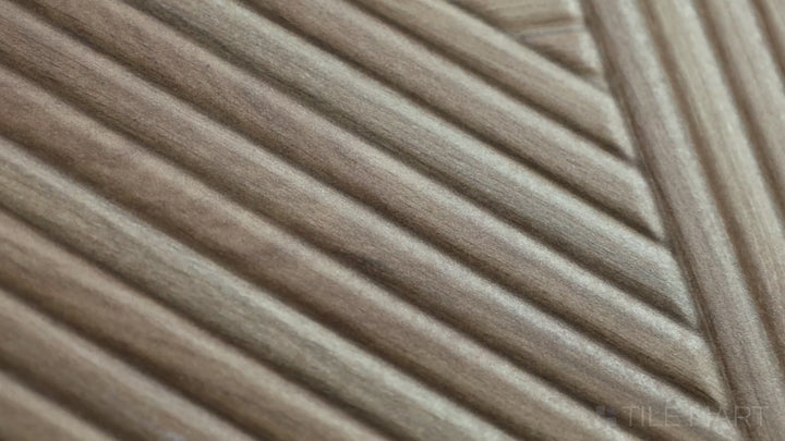 Video of Tangram Walnut 12.2X39.37 Matte Ceramic. A rich walnut brown ceramic tile with a matte surface, mimicking the look of real wood.