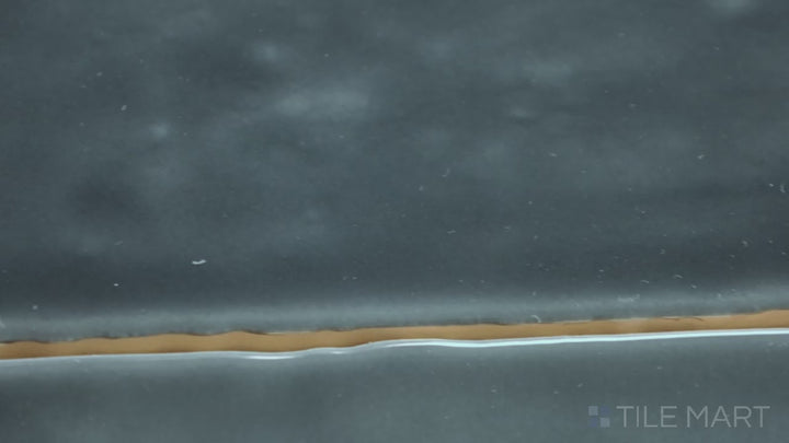 Video featuring Marin Midnight Tide 2.5X5 Gloss Glazed Ceramic. A deep blue glossy tile that brings an elegant oceanic touch to walls and backsplashes.