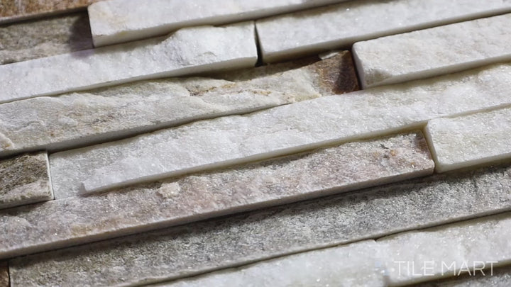 Video featuring Contemporary Mini Ledgestone Golden Honey 6x24 Natural Stone. A warm golden-toned natural stone tile with a ledgestone texture, offering a rich and organic feel.