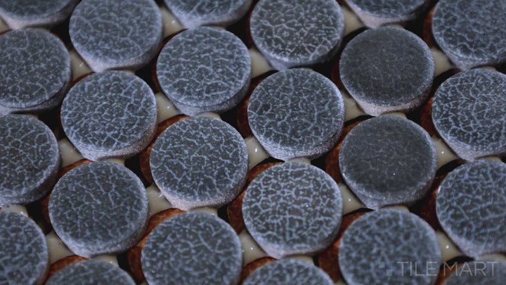 Video of Inyo Indigo Penny Round Matte Glazed Ceramic Mosaic. A rich navy blue penny round mosaic with a matte finish, enhancing depth and elegance in any setting.