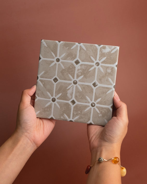 Full Piece Samples — decorative tile held by hands